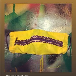 Yellow “Zip the lips” face mask with purple zipper